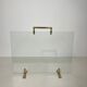 Glass and brass fire screen