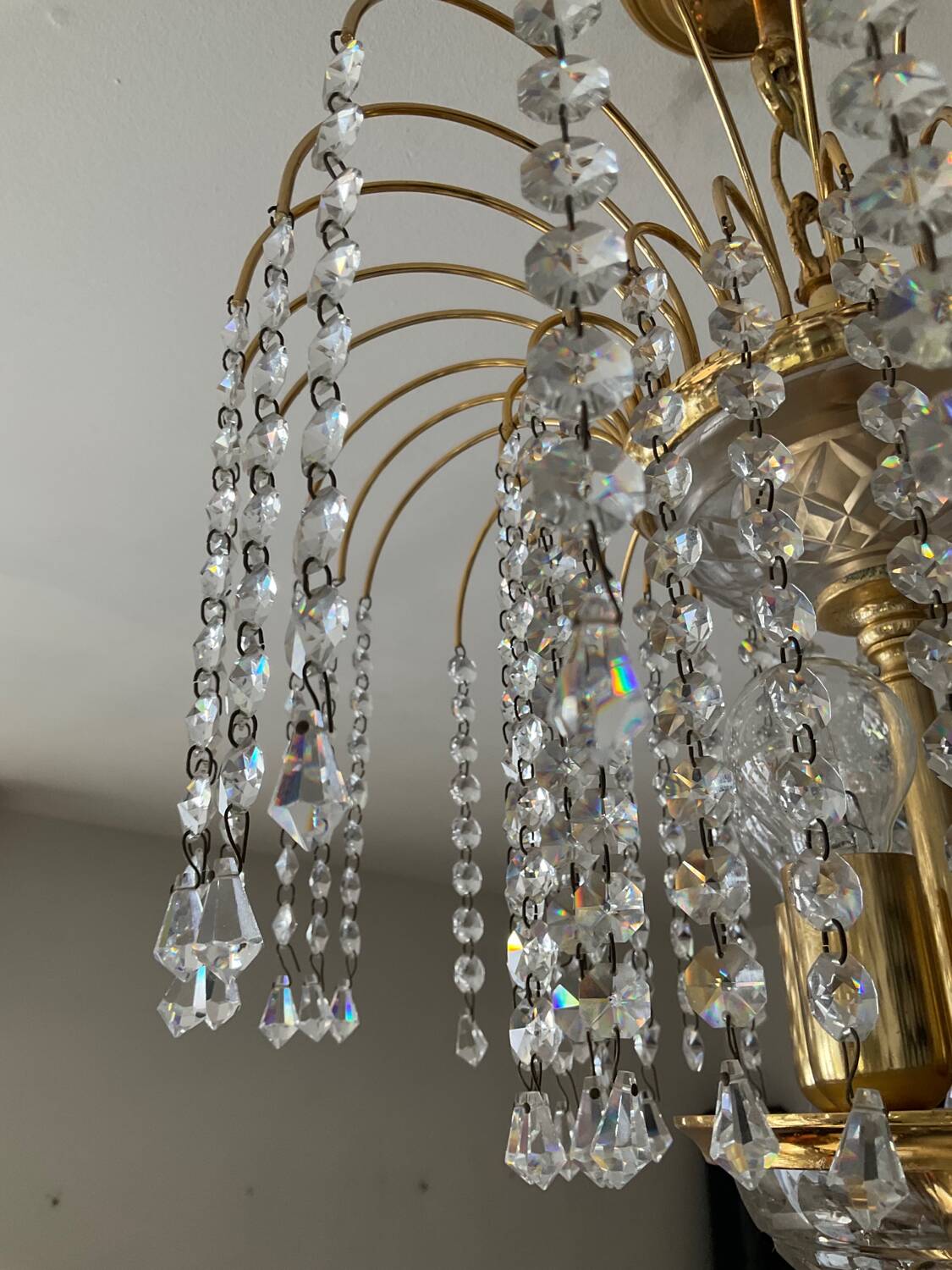 Brass waterfall chandelier with crystal tassels