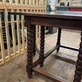 Wooden table with gateleg flaps