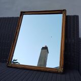 Miroir en bois, doré à la feuille d'or.