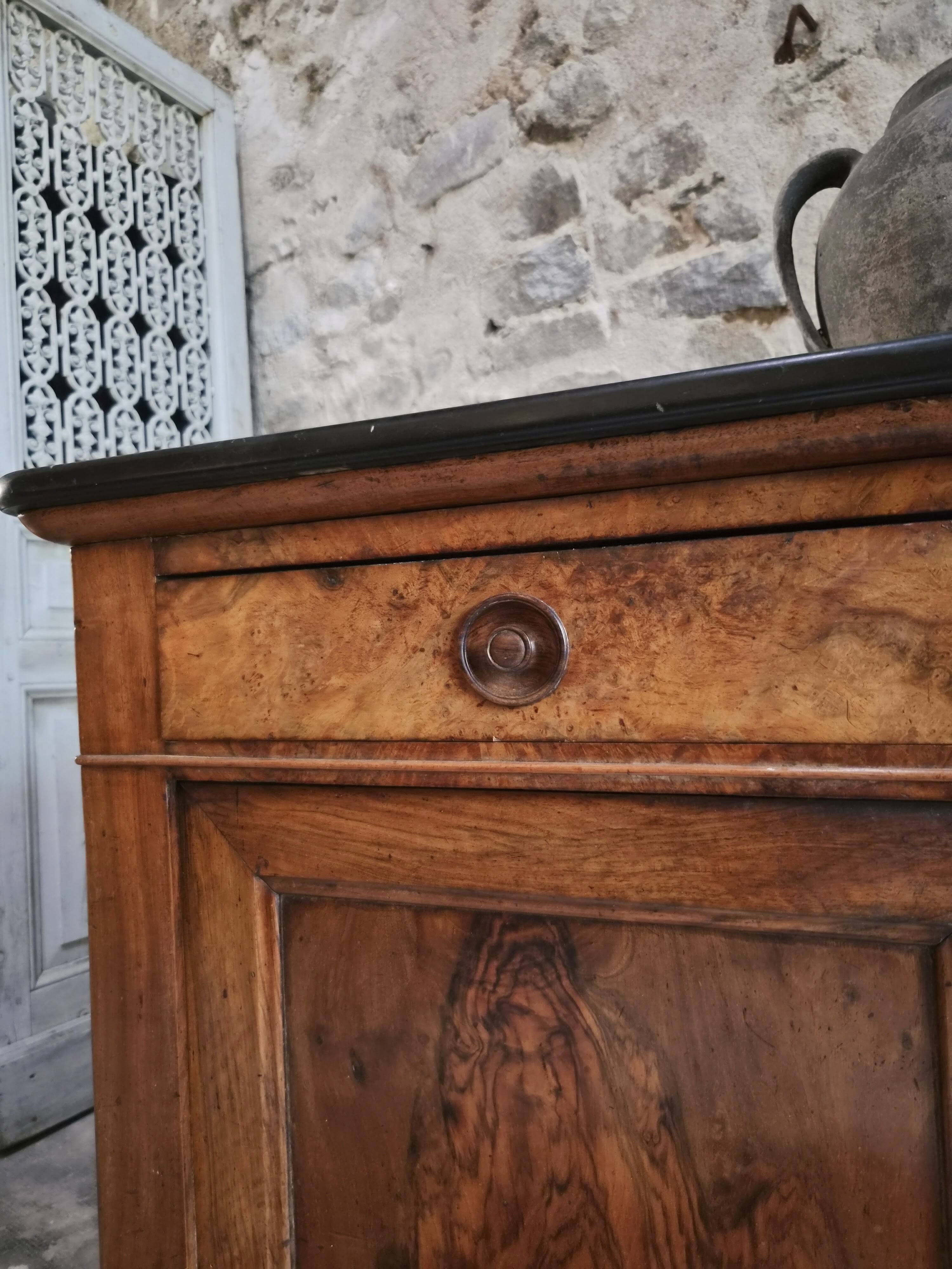 French Louis Philippe walnut buffet with black marble top, France, circa 1840–1860.