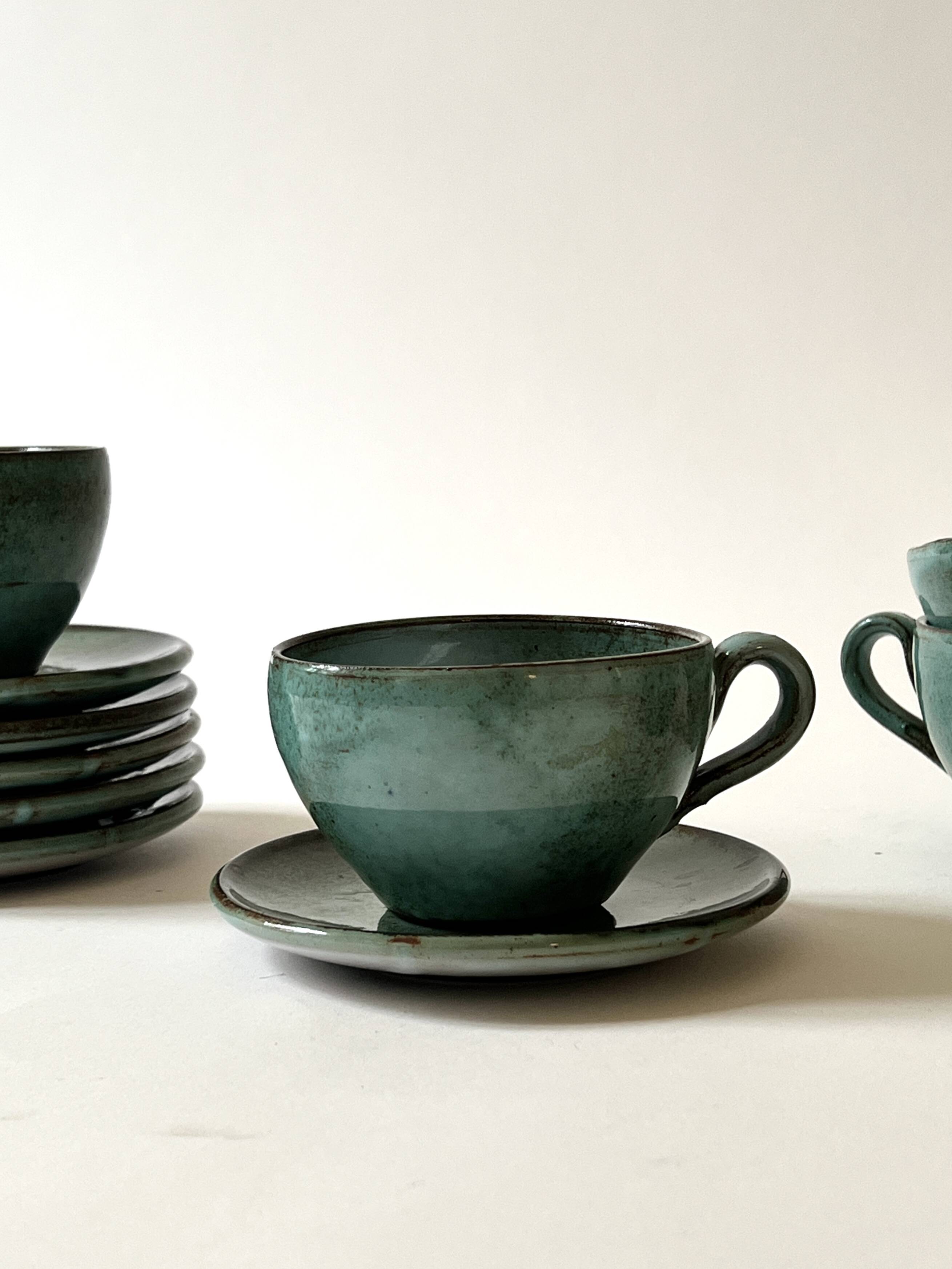 Handmade and signed glazed ceramic coffee cups, circa 1950.