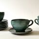 Handmade and signed glazed ceramic coffee cups, circa 1950.