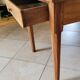 Old farmhouse table made of solid walnut wood.