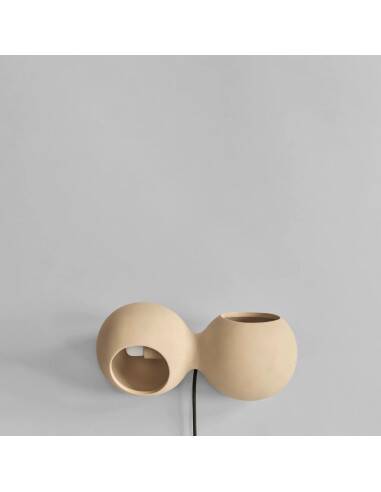 Table lamp or wall lamp in sand color made of ceramic, contemporary work.
