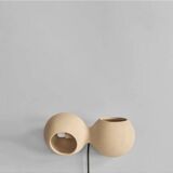 Table lamp or wall lamp in sand color made of ceramic, contemporary work.