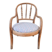 Vintage children's armchair in curved wood