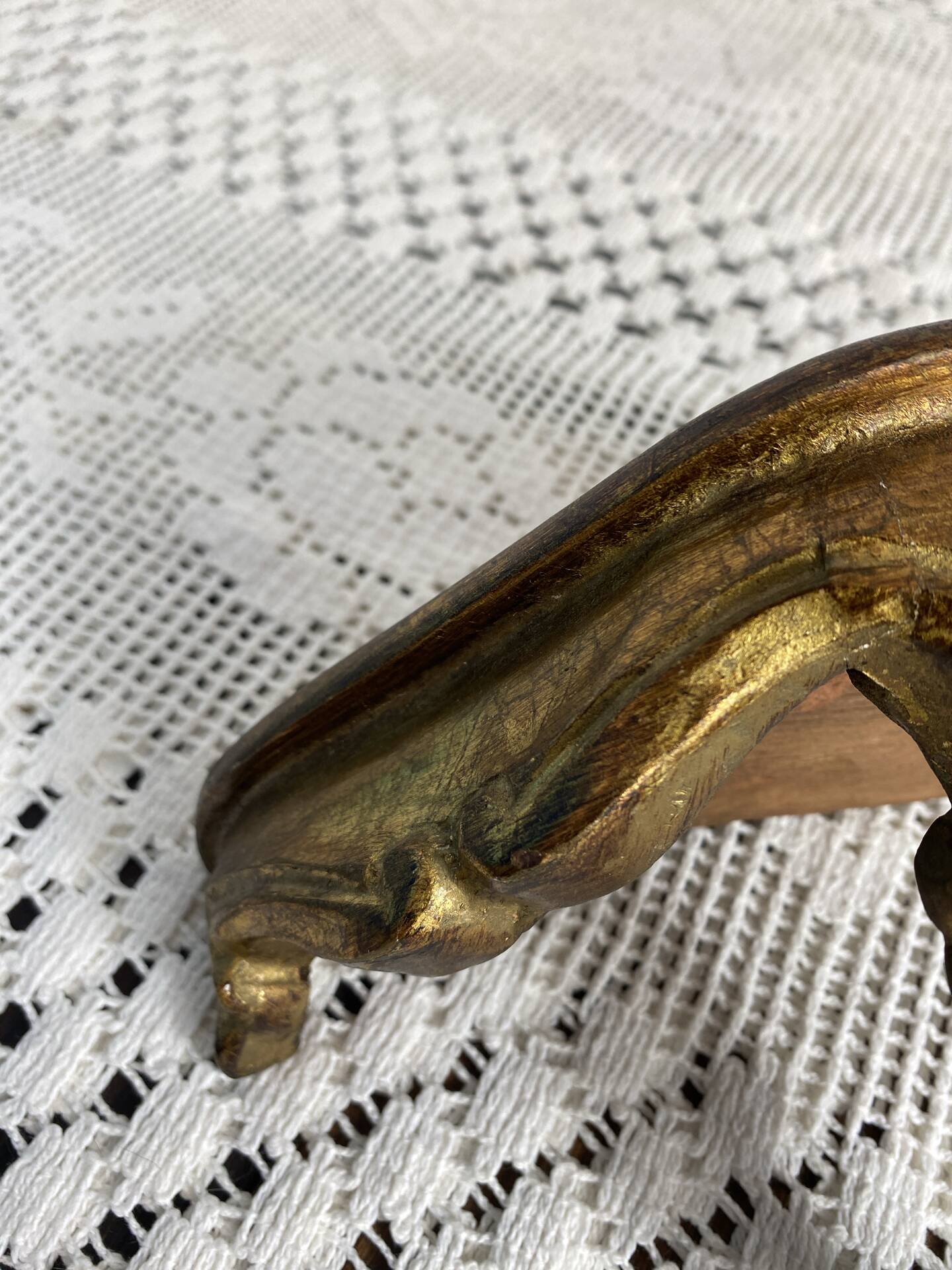 Small baroque-style console in gilded wood.
