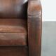 Beautifully shaped vintage sheepskin armchair with character