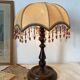 Lampe rétro bois tourné et perles 41 cm