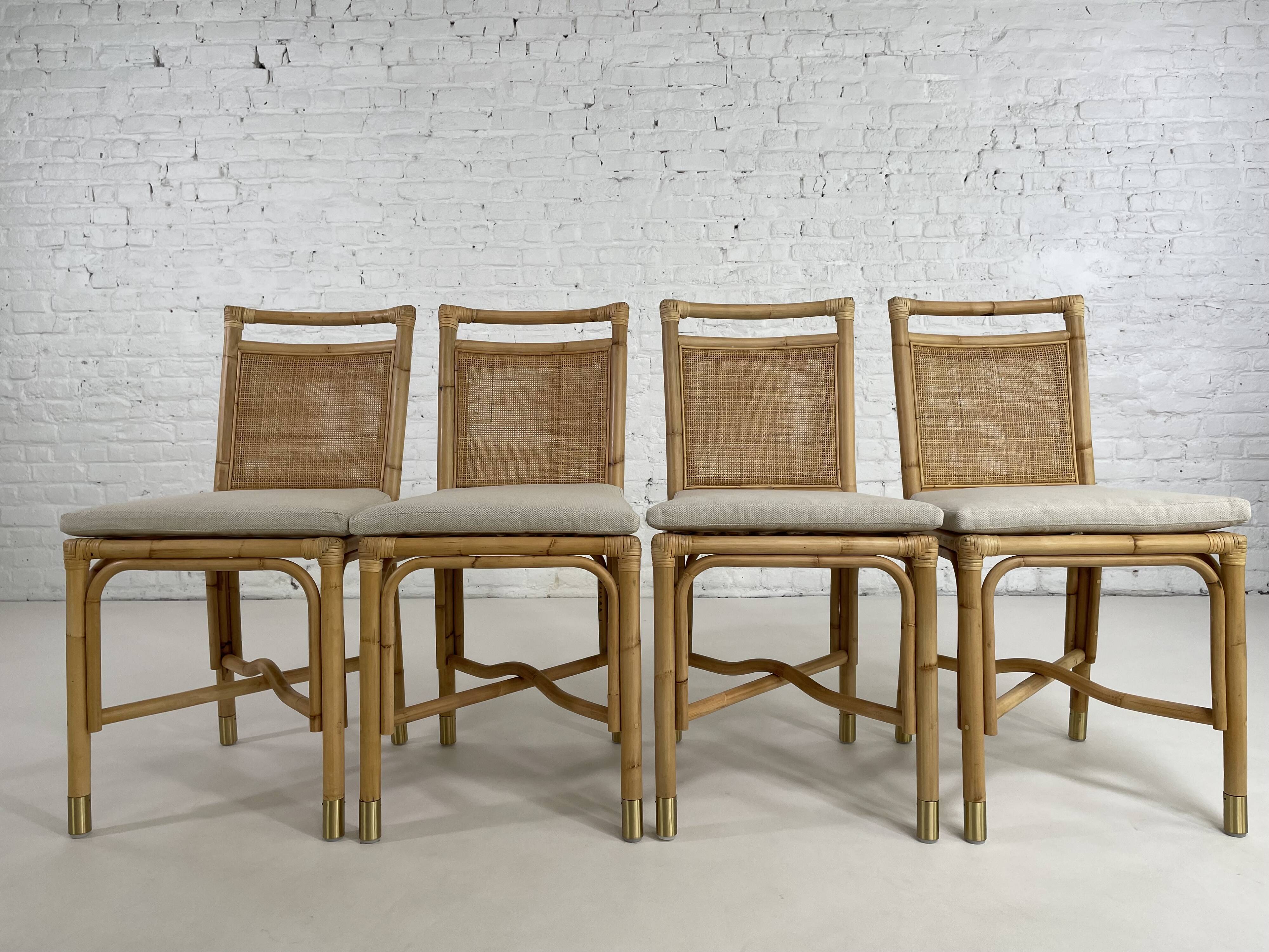 Suite de 4 chaises en rotin cannage et laiton