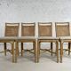 Suite de 4 chaises en rotin cannage et laiton