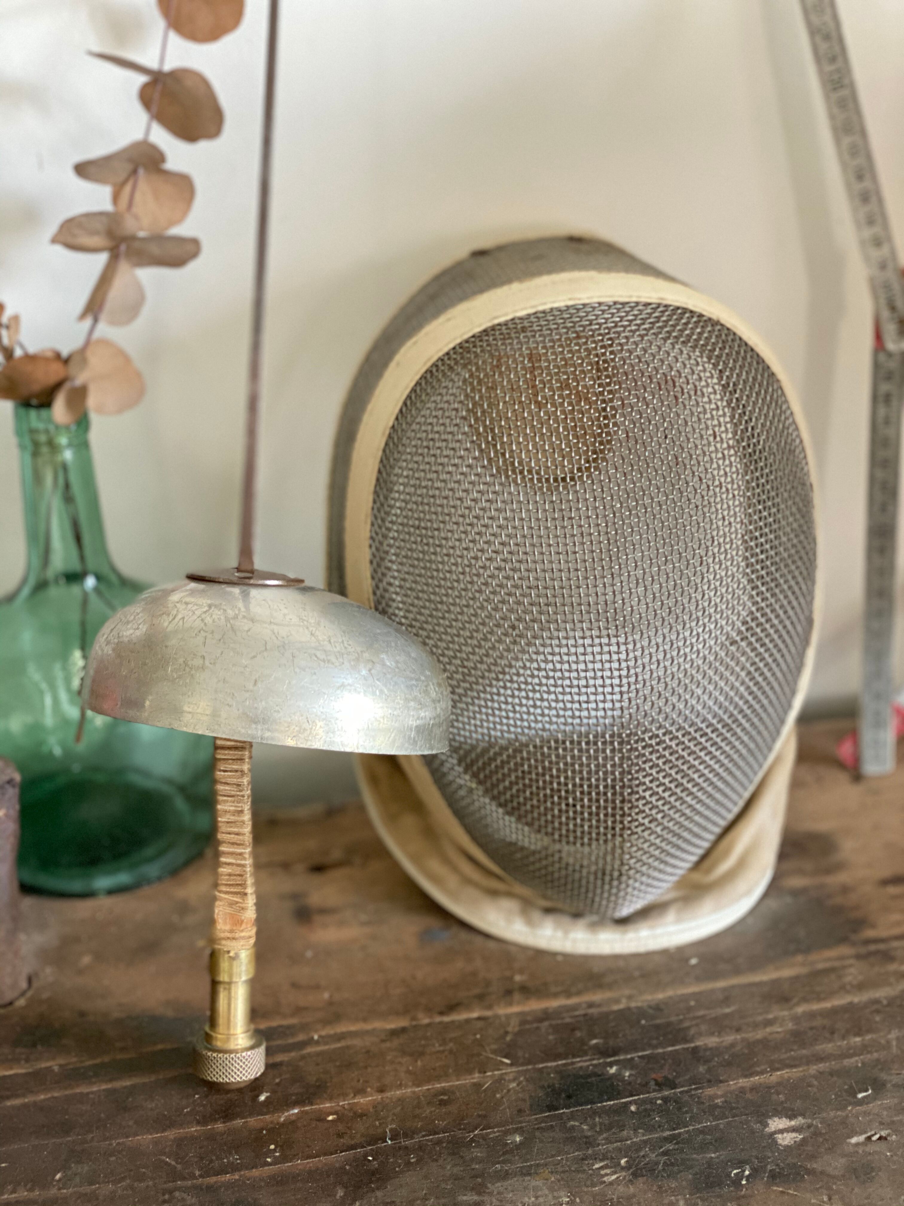 Old fencing mask set and its foil