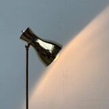 Minimalist brass floor lamp from the mid-century by Dieter Schulz for Wohnbedarf Ag, 1950s.