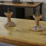 Pair of patinated cast iron candlesticks, 1940s