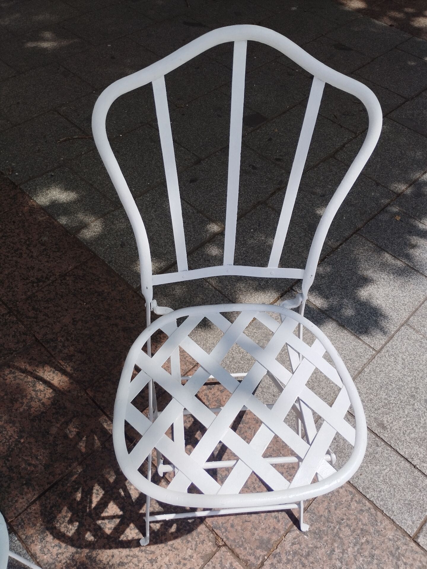 Antique garden furniture in solid wrought iron.