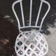 Antique garden furniture in solid wrought iron.