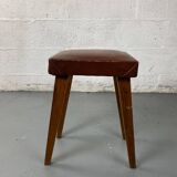 Small stool or footrest in wood and leather