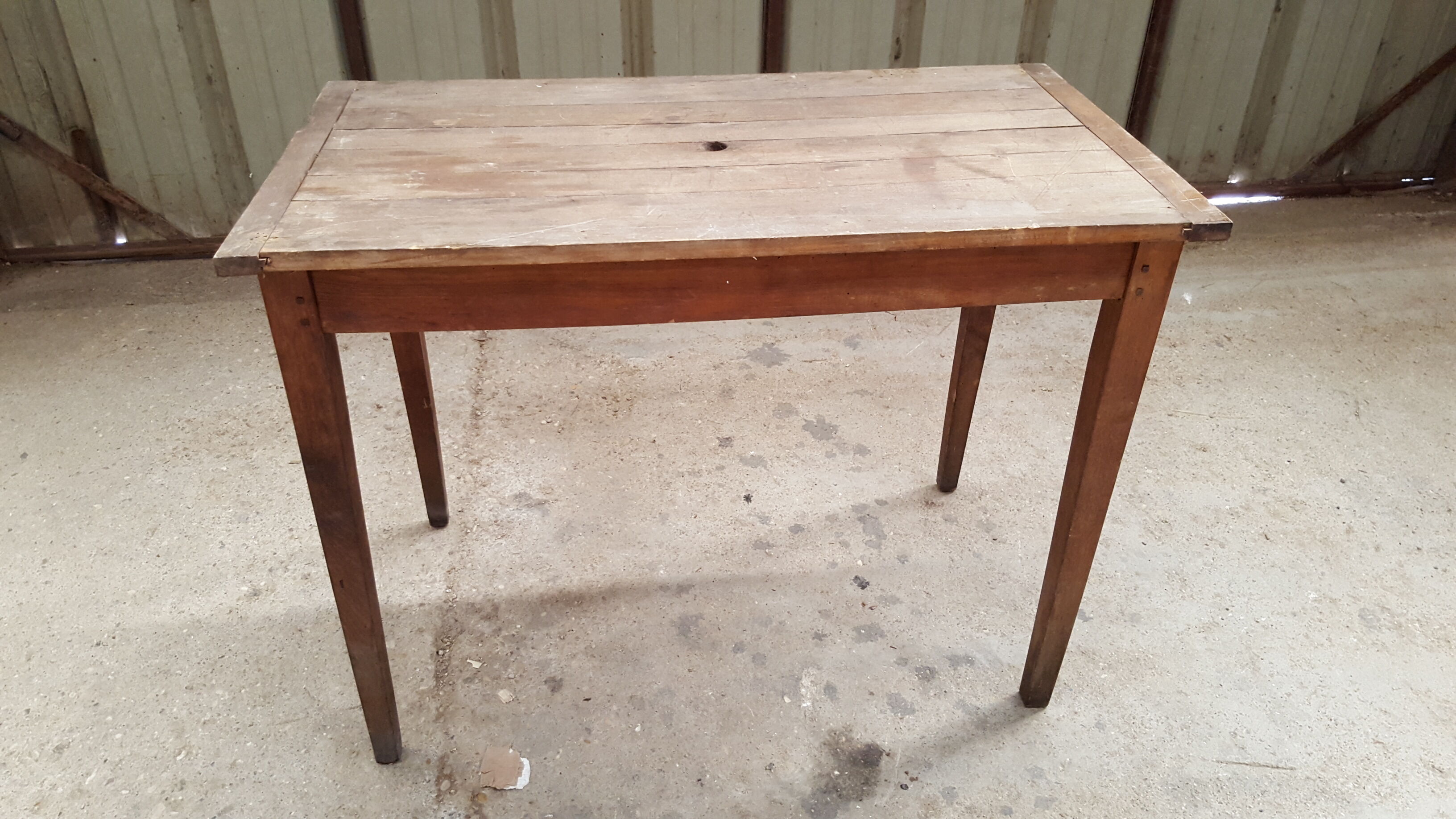 Old table feet spindles one drawer piling