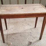 Old table feet spindles one drawer piling