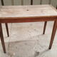 Old table feet spindles one drawer piling
