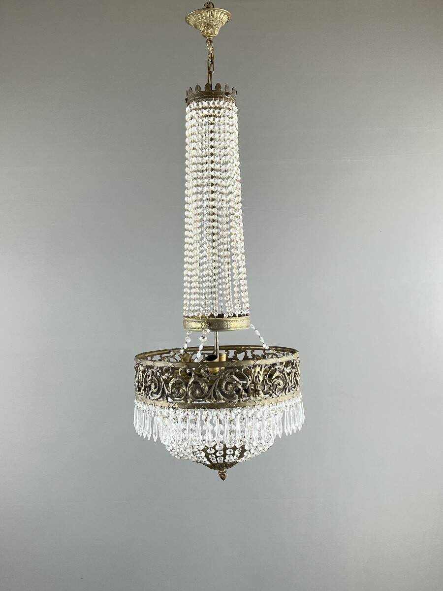 Empire-style chandelier in bronze with crystal pendants, early 20th century.