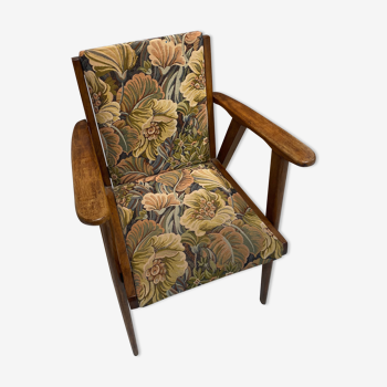 Vintage wooden armchair and floral fabric