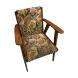 Vintage wooden armchair and floral fabric