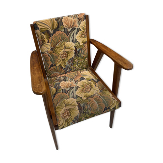 Vintage wooden armchair and floral fabric