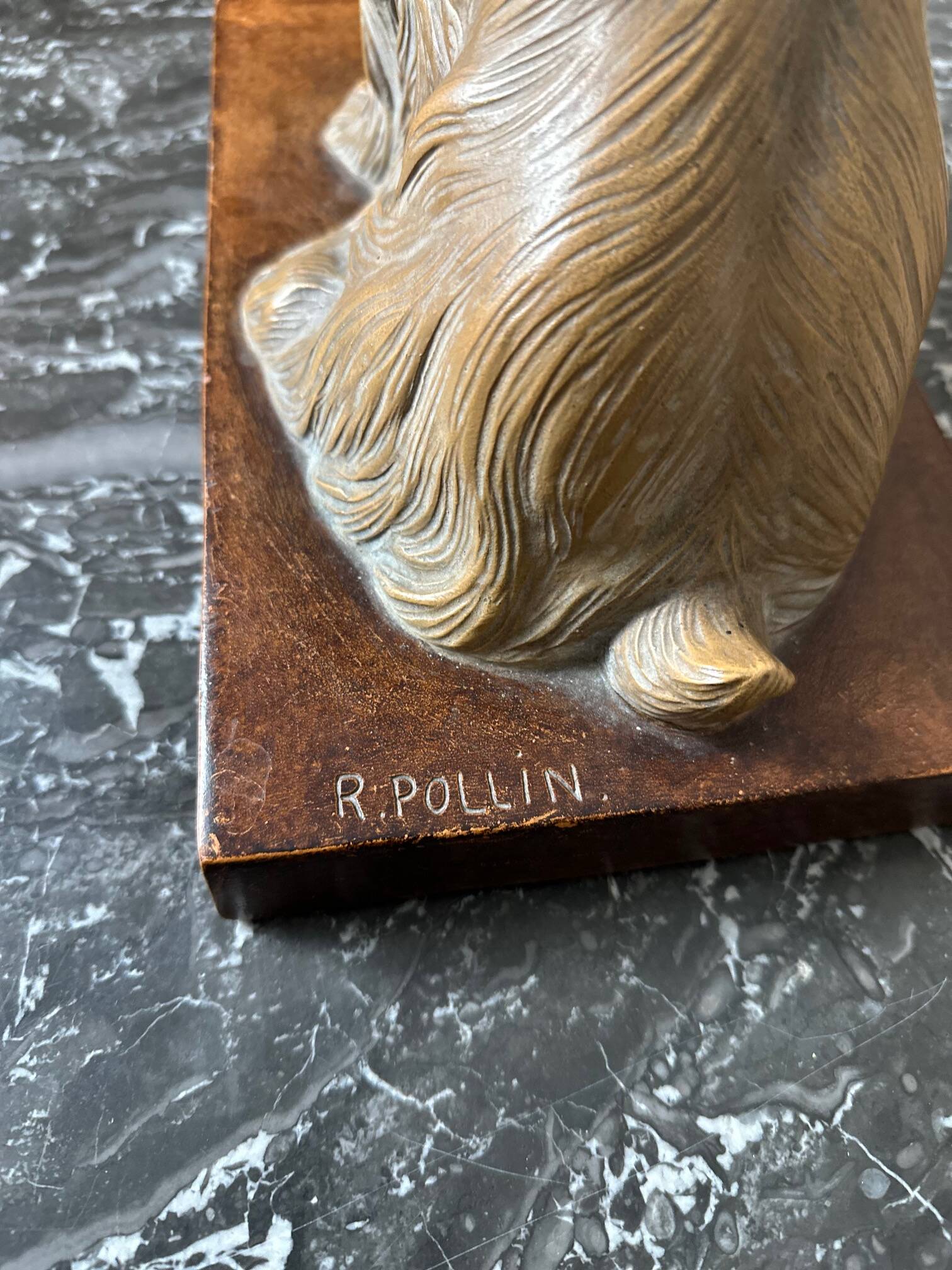 Terracotta dog signed R. Pollin