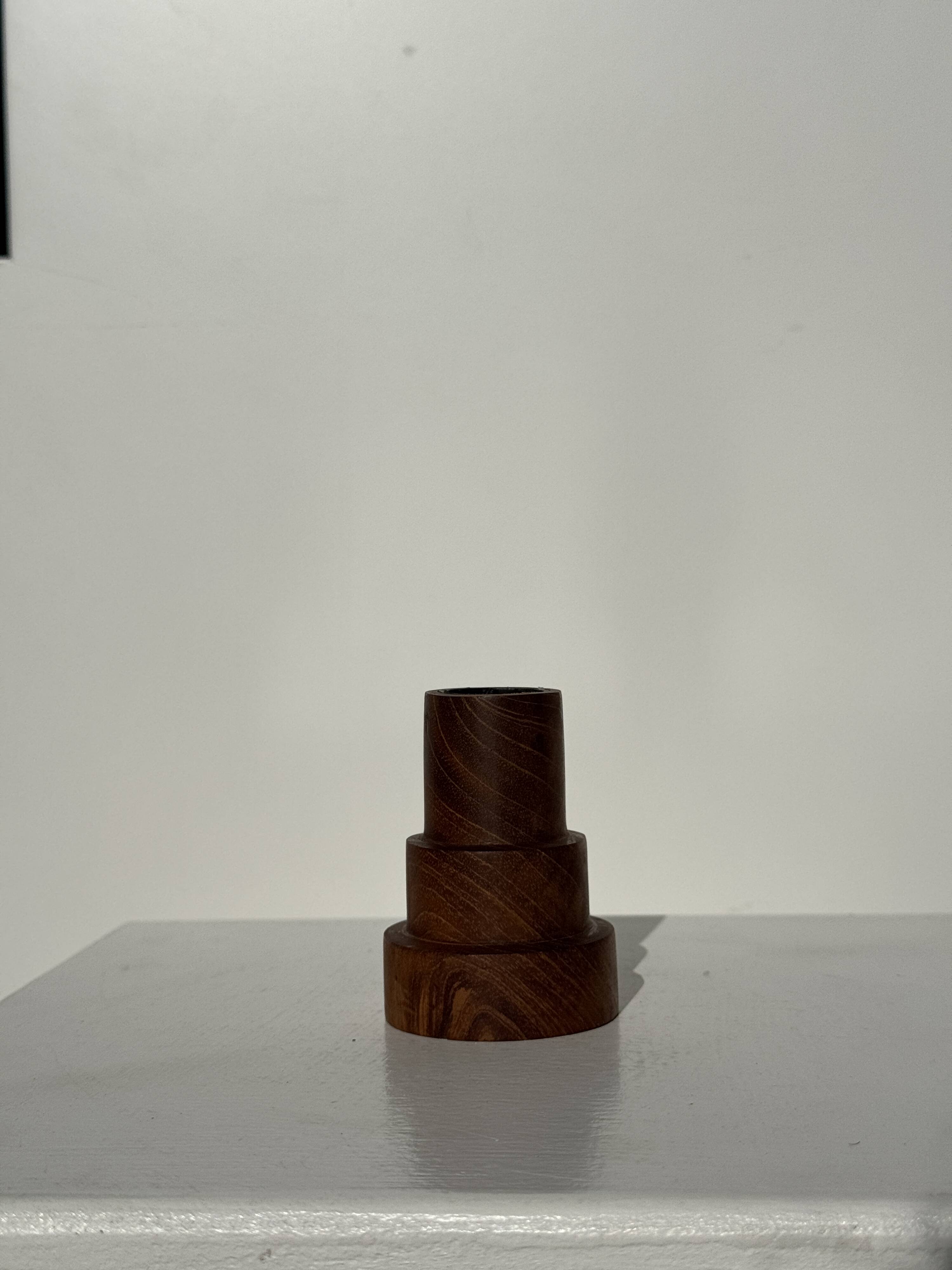 Pyramidal circular teak monoxyle candlestick H7 D5