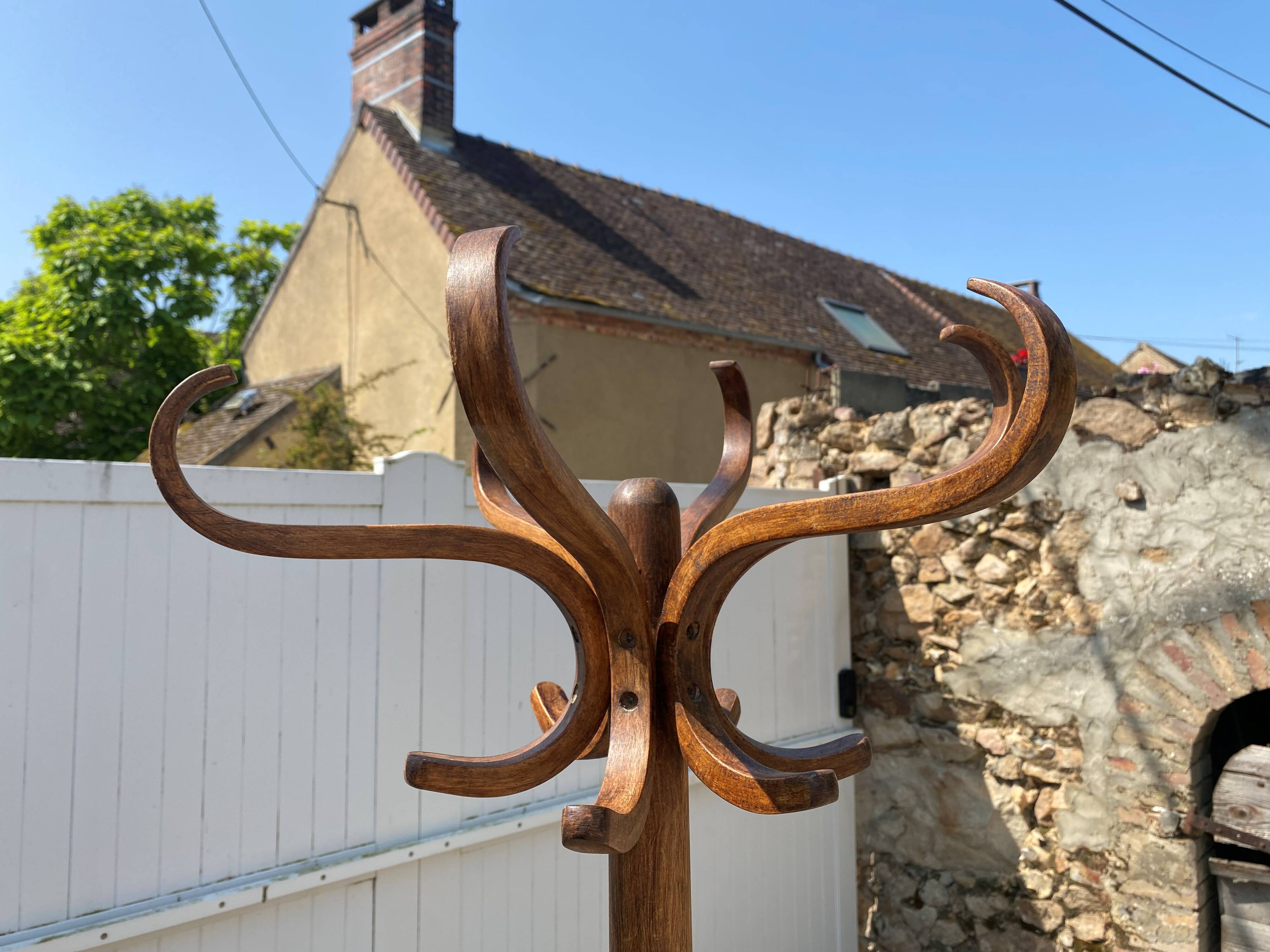 Baumann bistro style 1960s curved wood swivel parrot coat rack
