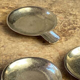 Individual brass ashtrays with storage support