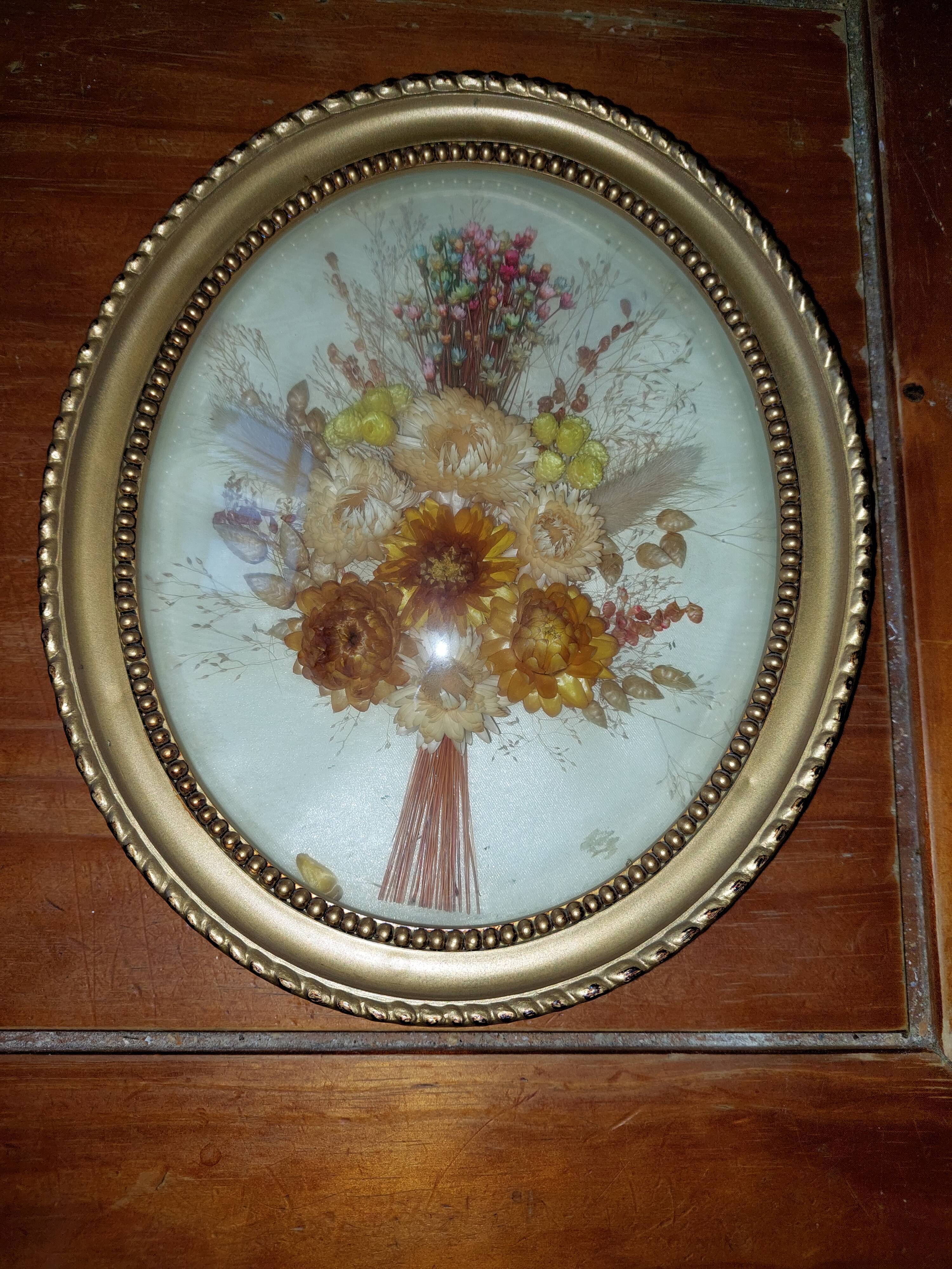 Oval frame domed dried flowers occasion