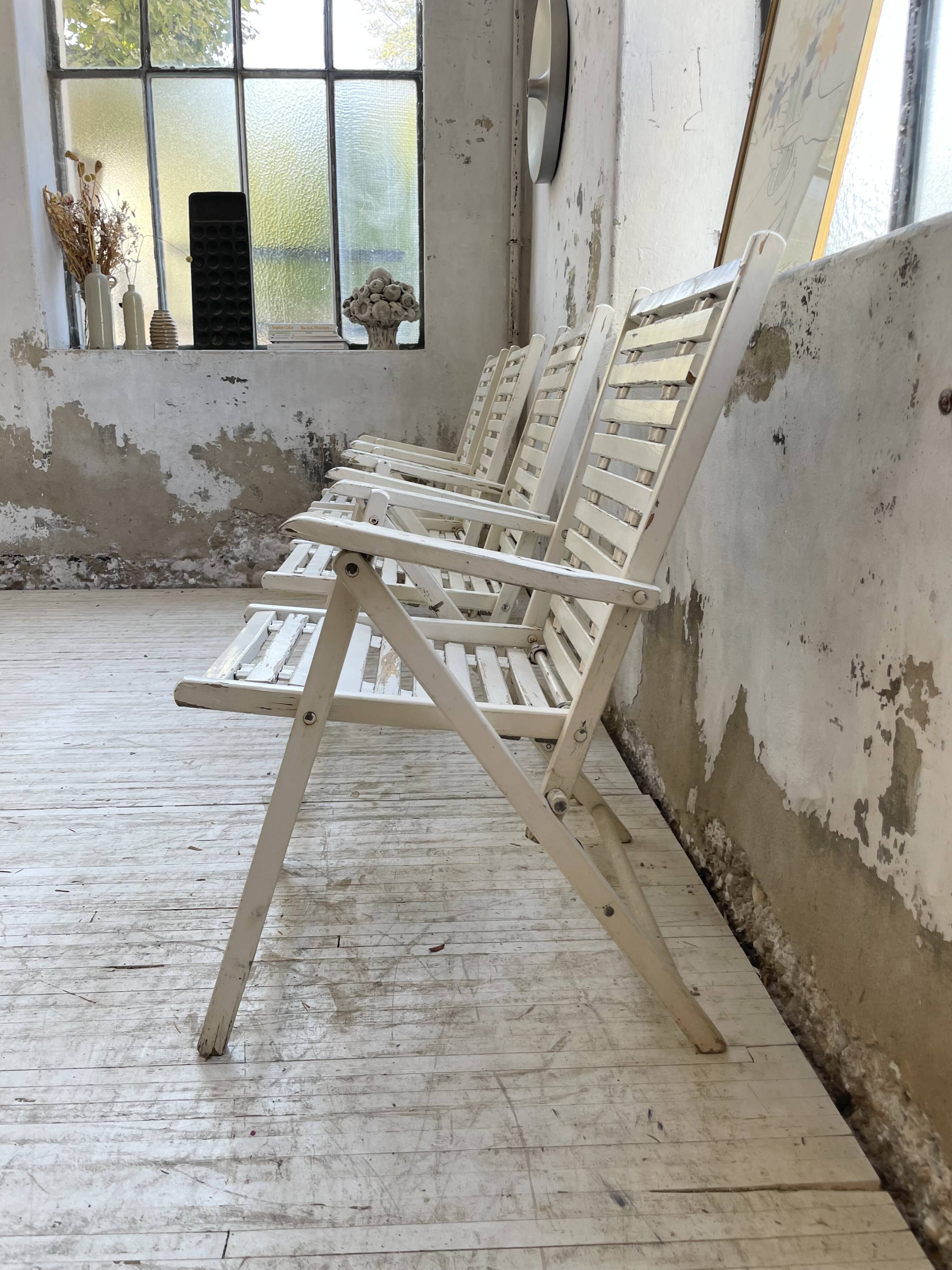 4 white wooden garden chairs