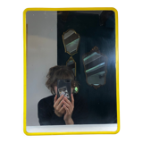 1970s mirror yellow plastic frame