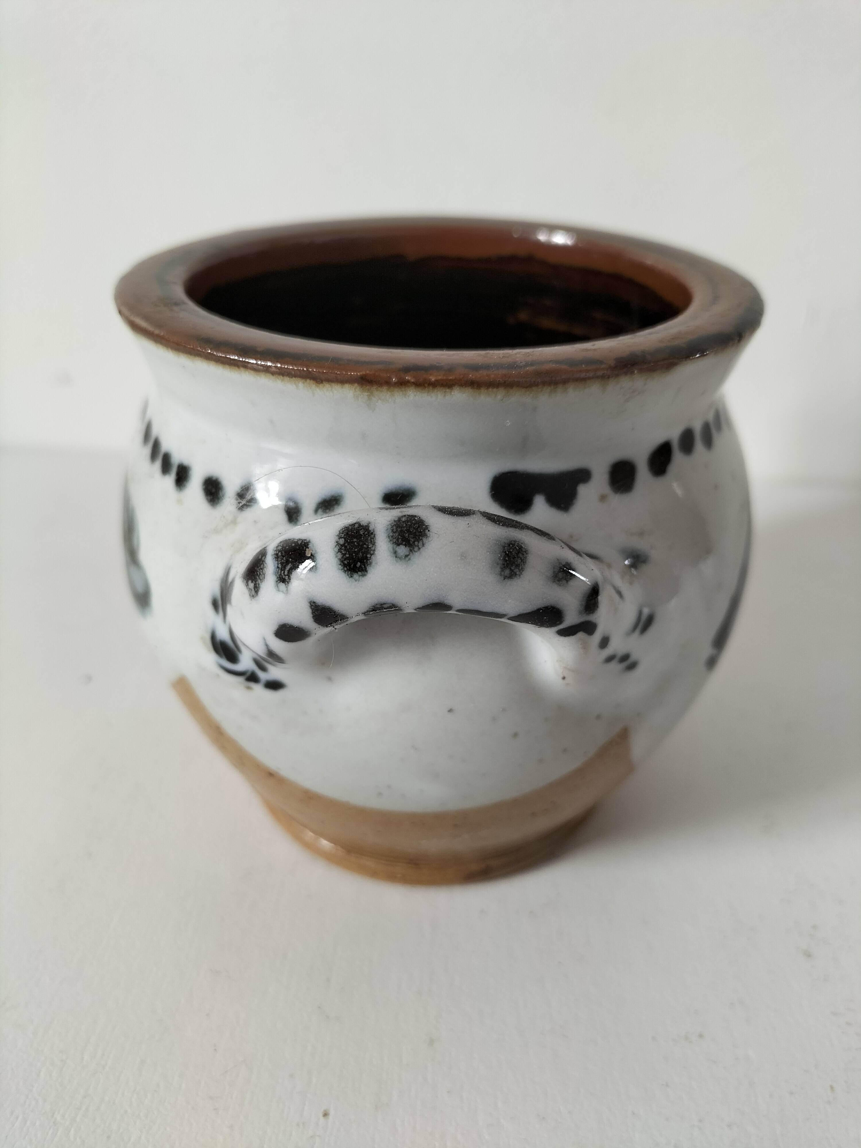 Small glazed earthenware jar