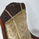 An antique armchair from the turn of the 19th and 20th centuries, carved wa