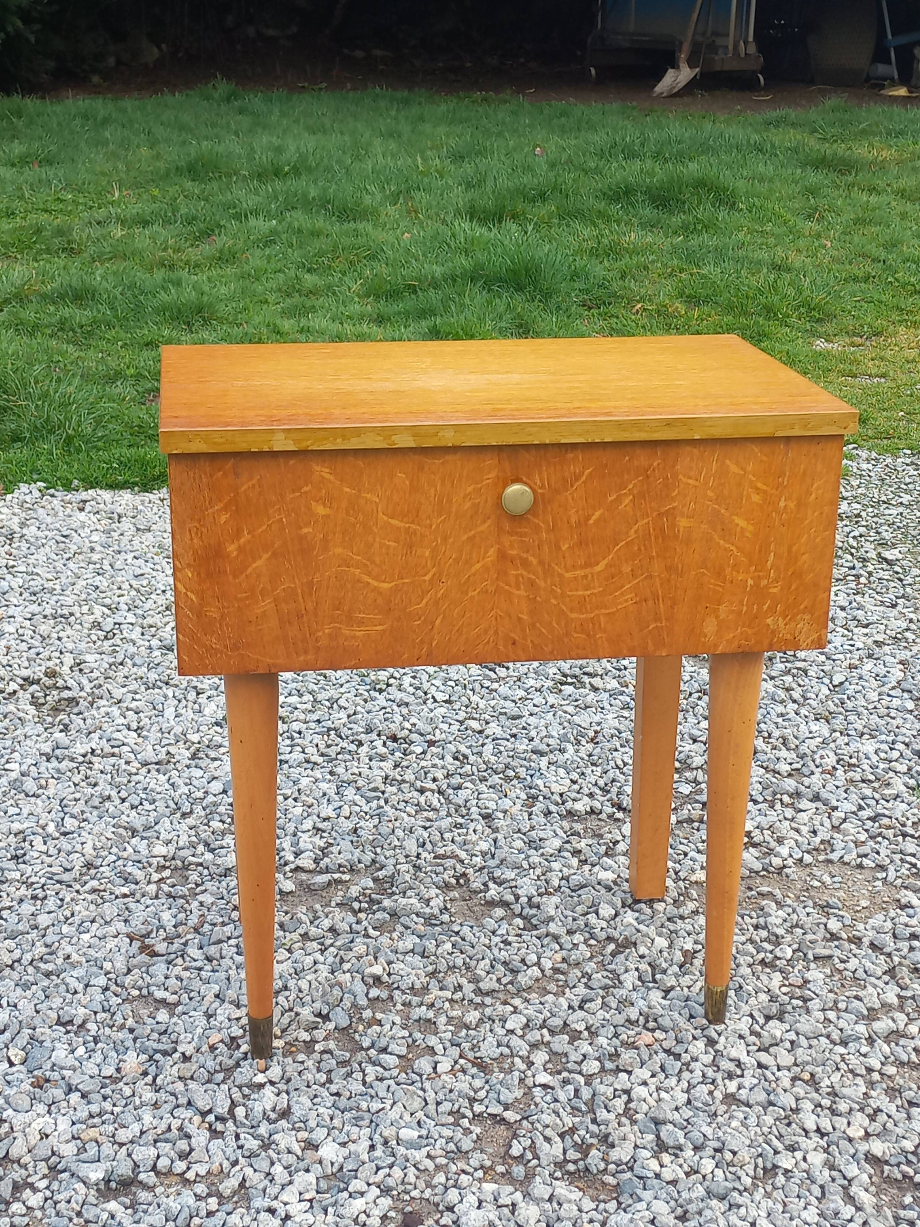 Vintage 1950s bedside table in blond oak with conical legs