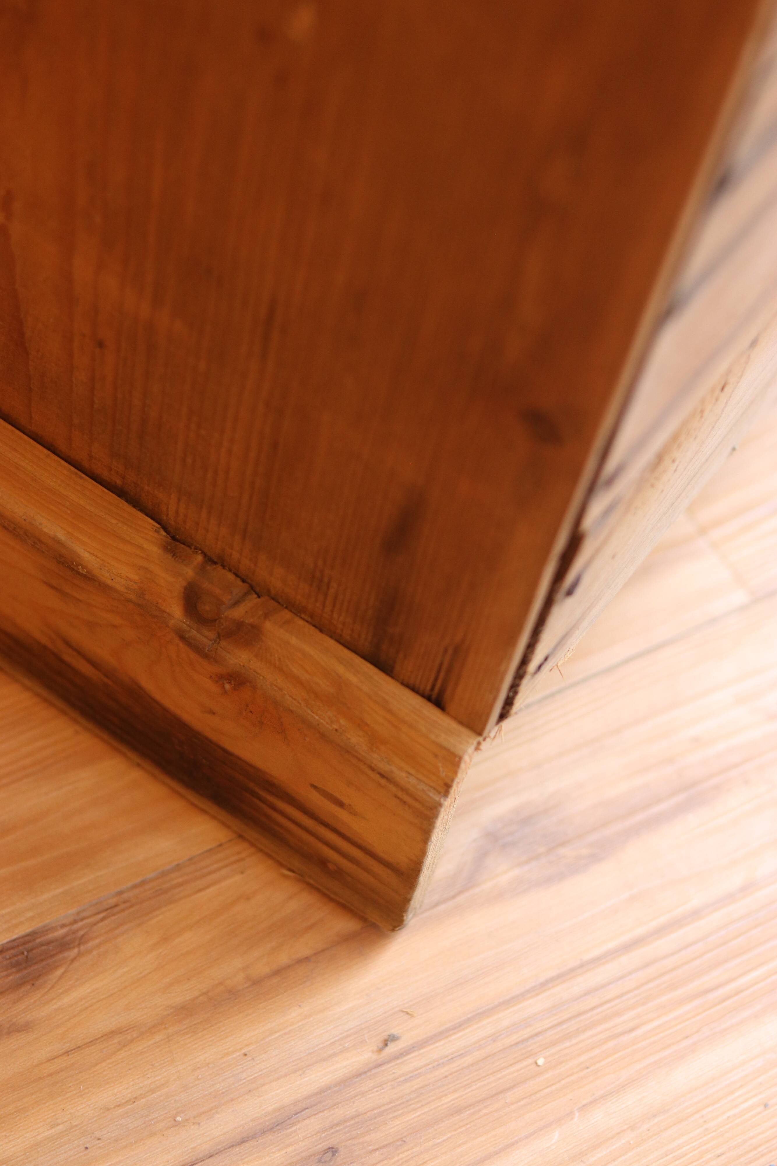 Large storage unit with compartments in waxed pine, early 20th century.