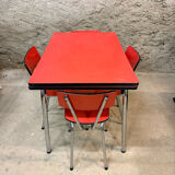 4 red Formica chairs with a 1970s table