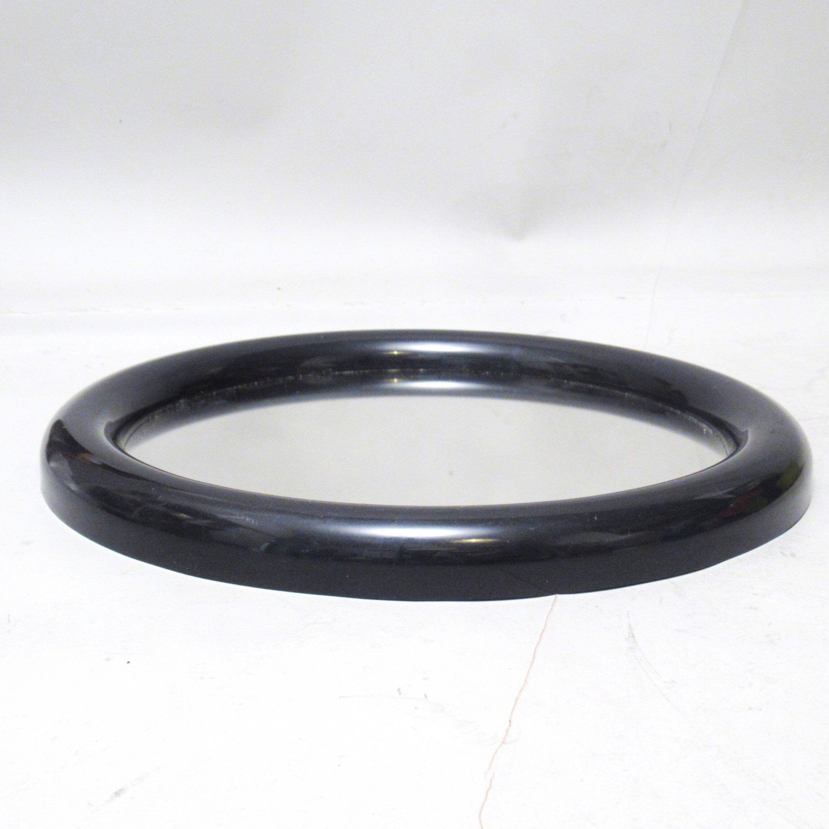 Round black plastic mirror 1970s