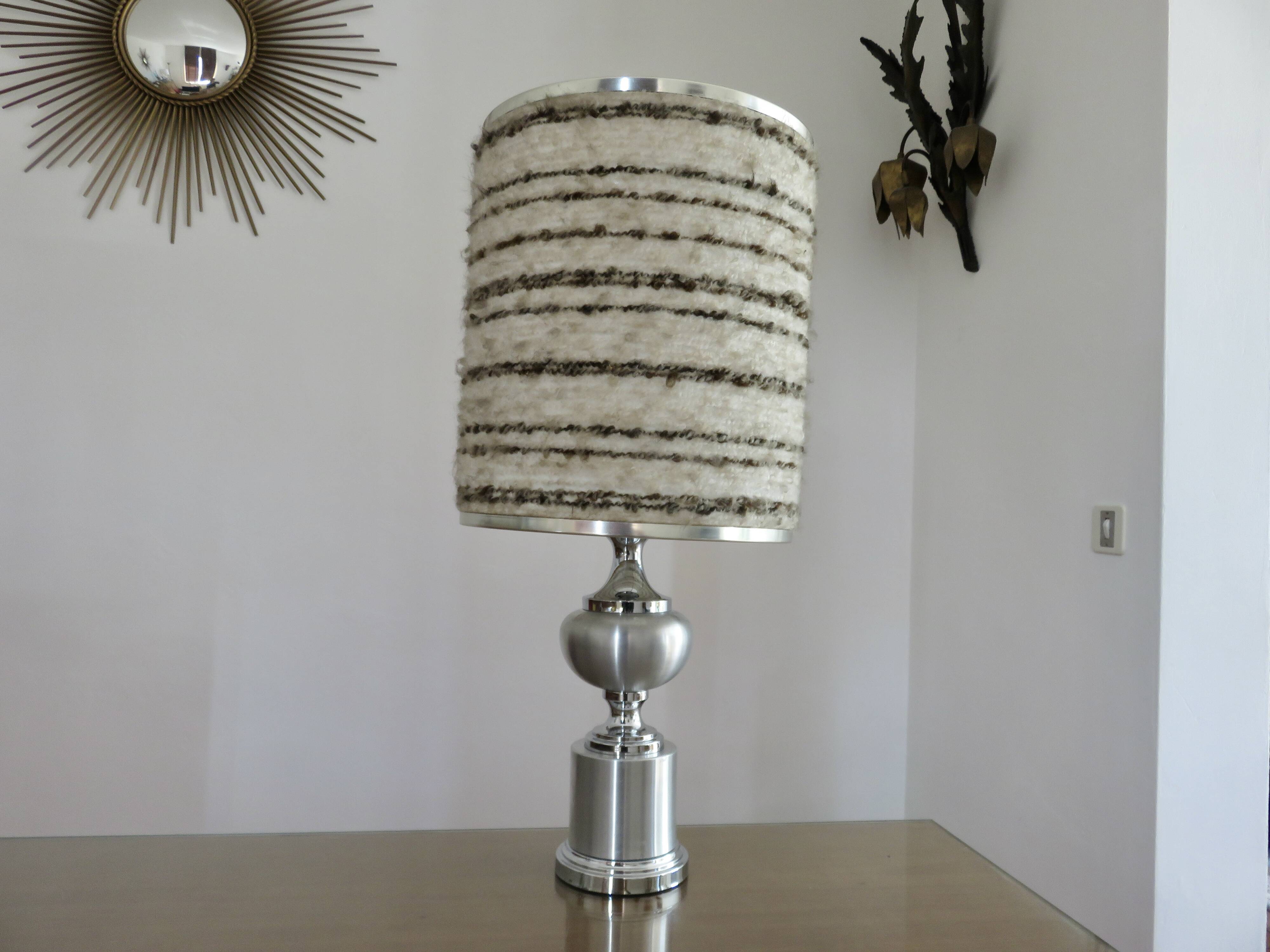 Brushed aluminum and chrome lamp typical of the 70s