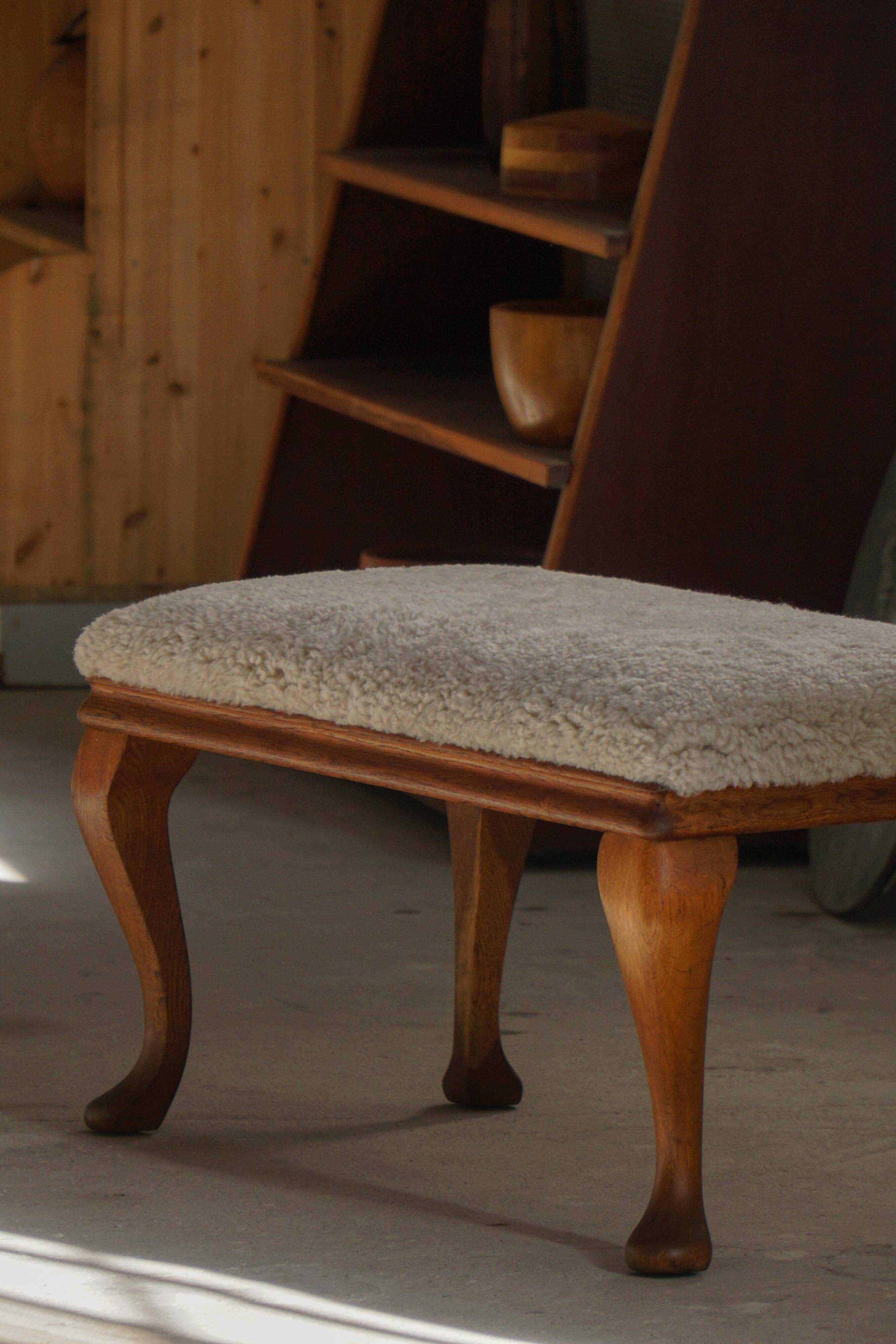 Danish rococo-style bench, cabriole legs and lambswool seat, early 20th century.