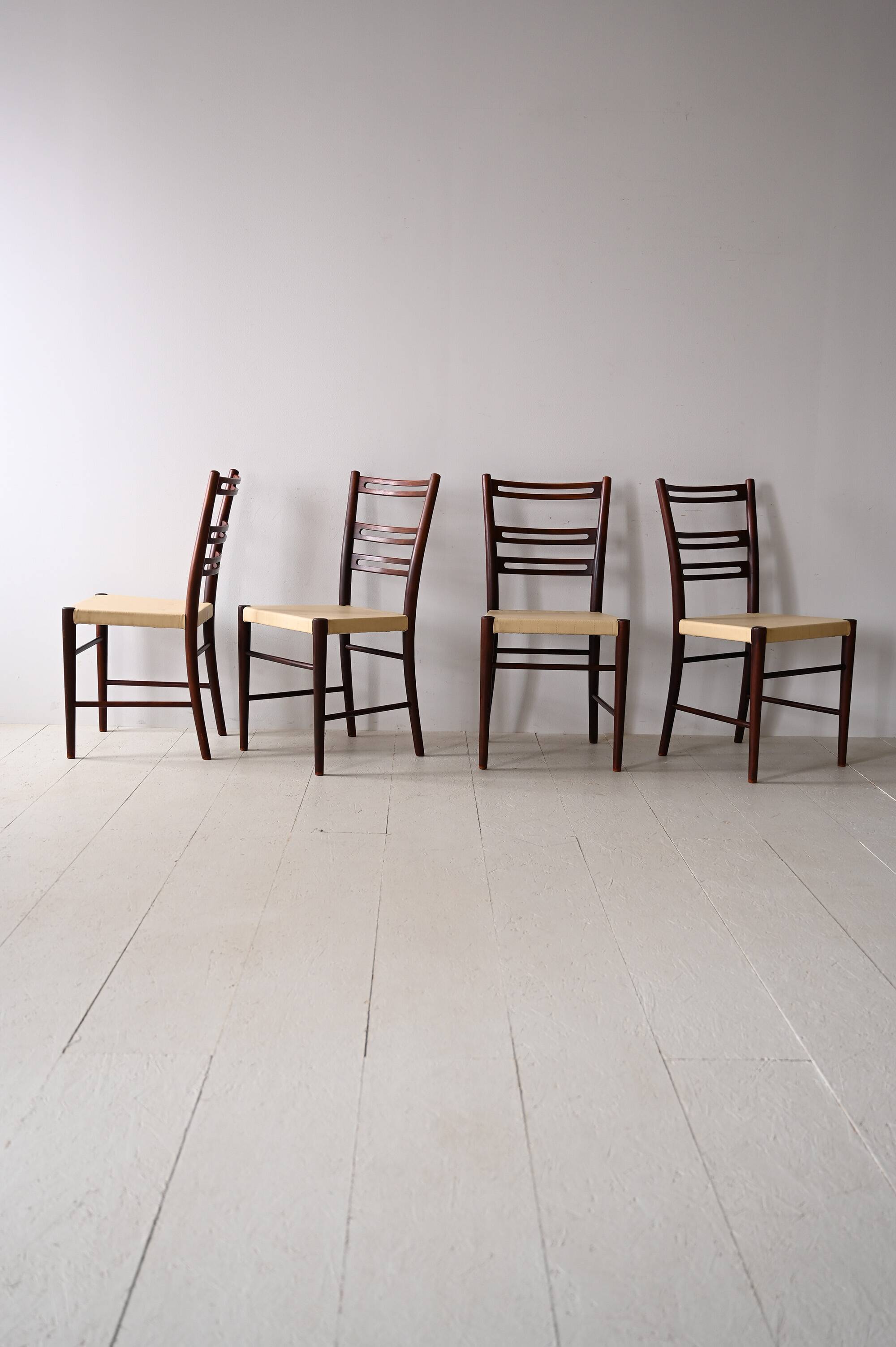 Scandinavian chairs in wood and leather