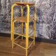 2 high metal workshop stools