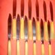 Set of 12 table knives and 12 cheese knives in bone and stainless steel.