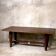 Art Deco table from the 1930s in wood and gilded brass.