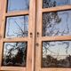 Parisian wardrobe in raw wood with engraved glass from 1920.