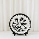 Large ceramic plate J. Lurçat with zoomorphic decoration in black on a white background.